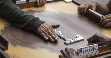 hand showing dominoes